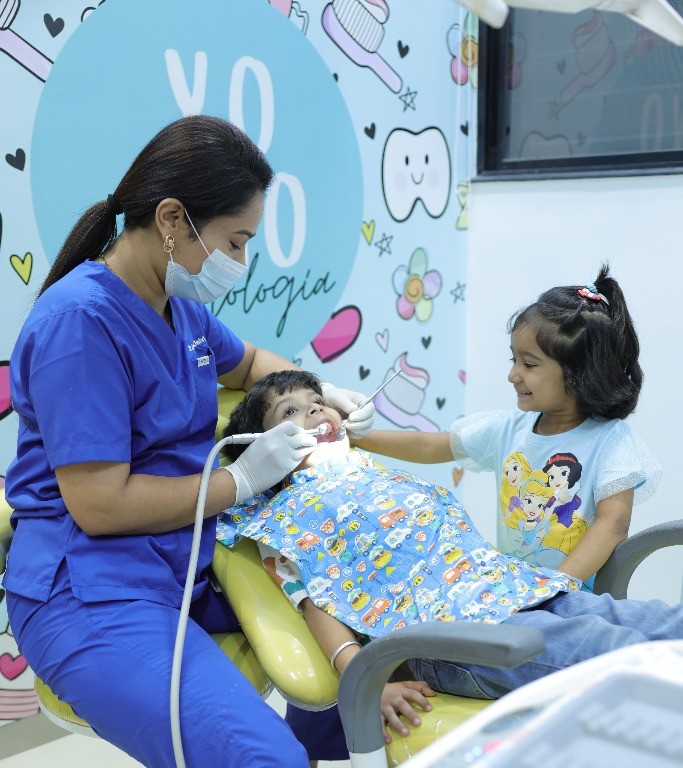 Dentist treating child